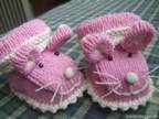 Hand knitted baby booties